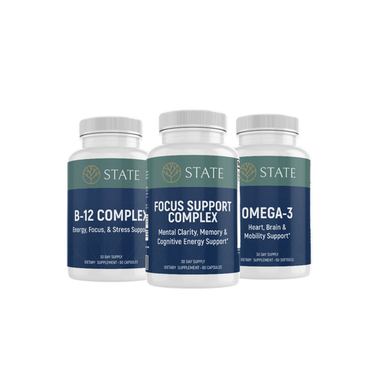 Three supplement bottles labeled B-12 Complex, Focus Support Complex, and Omega-3 on a white background.